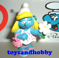 20421 - SMURFETTE WITH FLOWER
