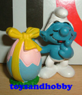 2.0490 - SMURF WITH EASTER EGG, LILAC VERSION (BY SCHLEICH)