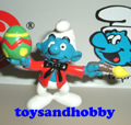 5.20512 - SMURF PAINTING AN EGG (BY SCHLEICH)