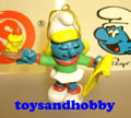 51909 - CHRISTMAS SMURFETTE SINGING A CAROL